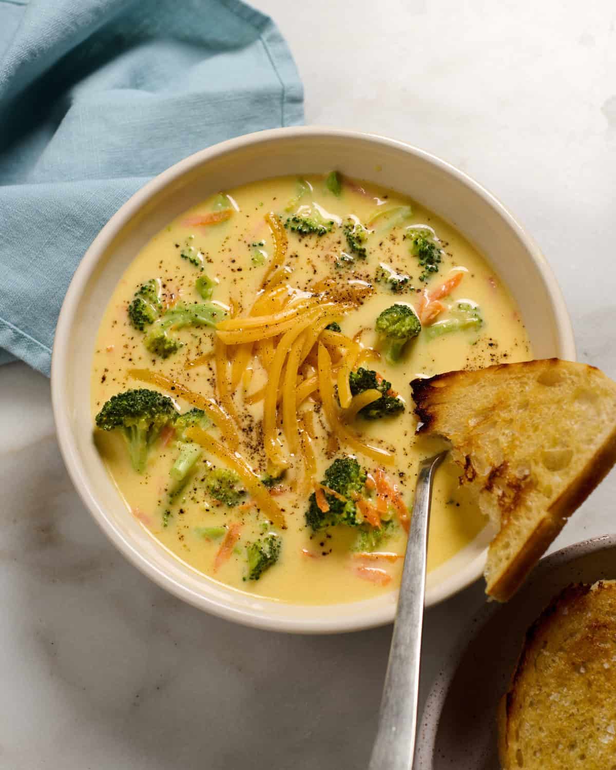 Creamy broccoli cheddar soup in a bowl