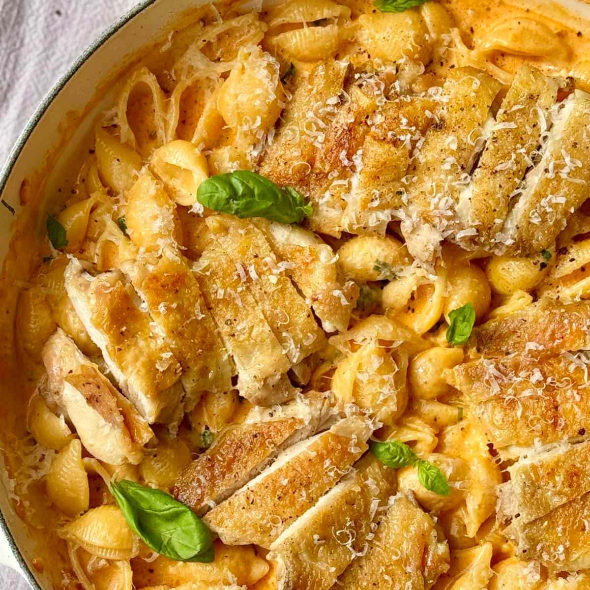 Chicken parmesan garlic pasta with basil