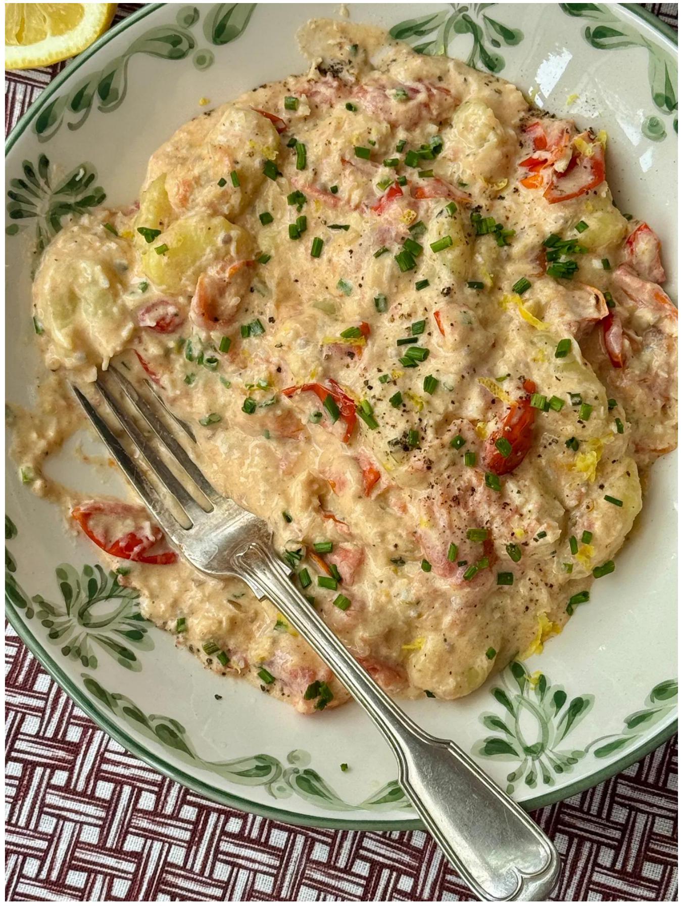 Creamy crab gnocchi with cherry tomatoes and herbs