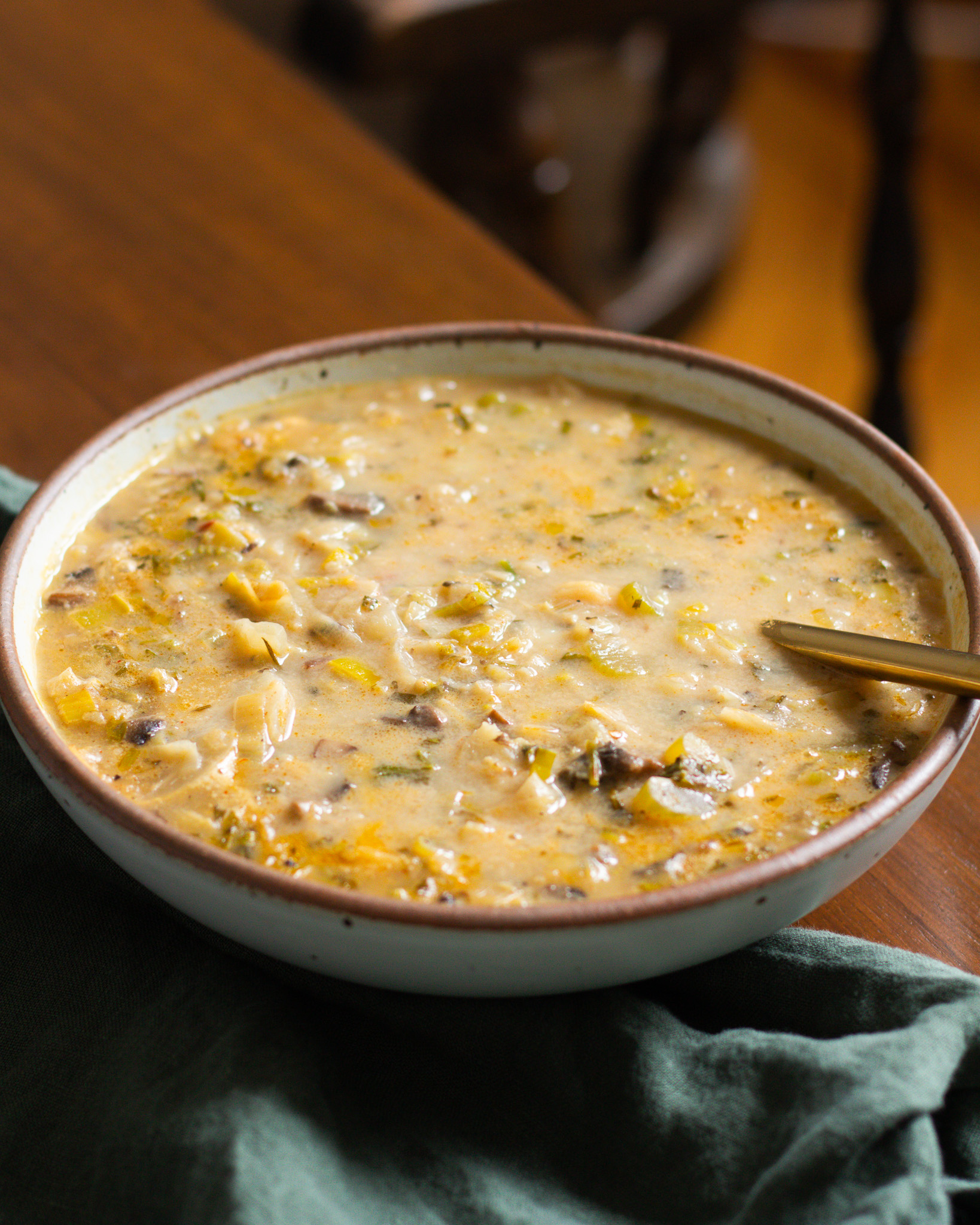 Leek and mushroom soup topped with toasted croutons