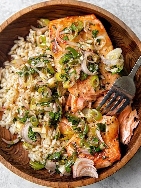 Miso butter salmon with scallion salsa verde over rice