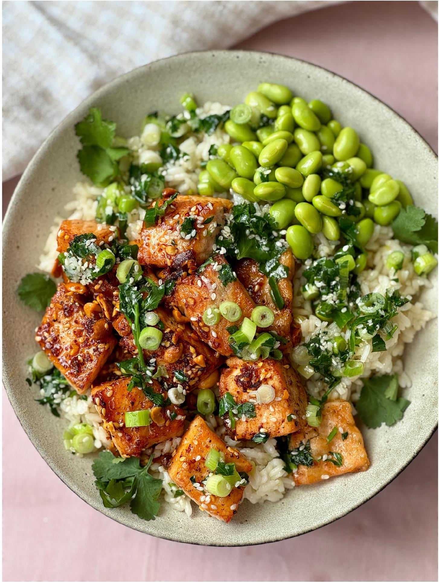 Hot honey salmon bites over ginger and spring onion rice