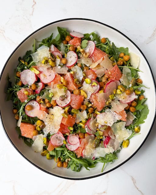 Spring arugula grapefruit salad with chickpeas and pistachios