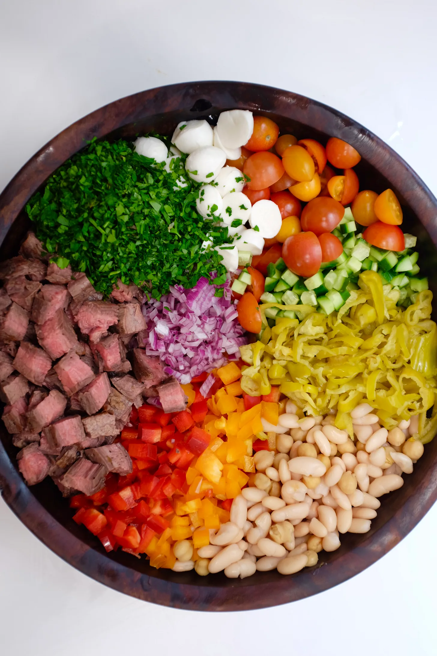 Steak Italian dense bean salad in a bowl