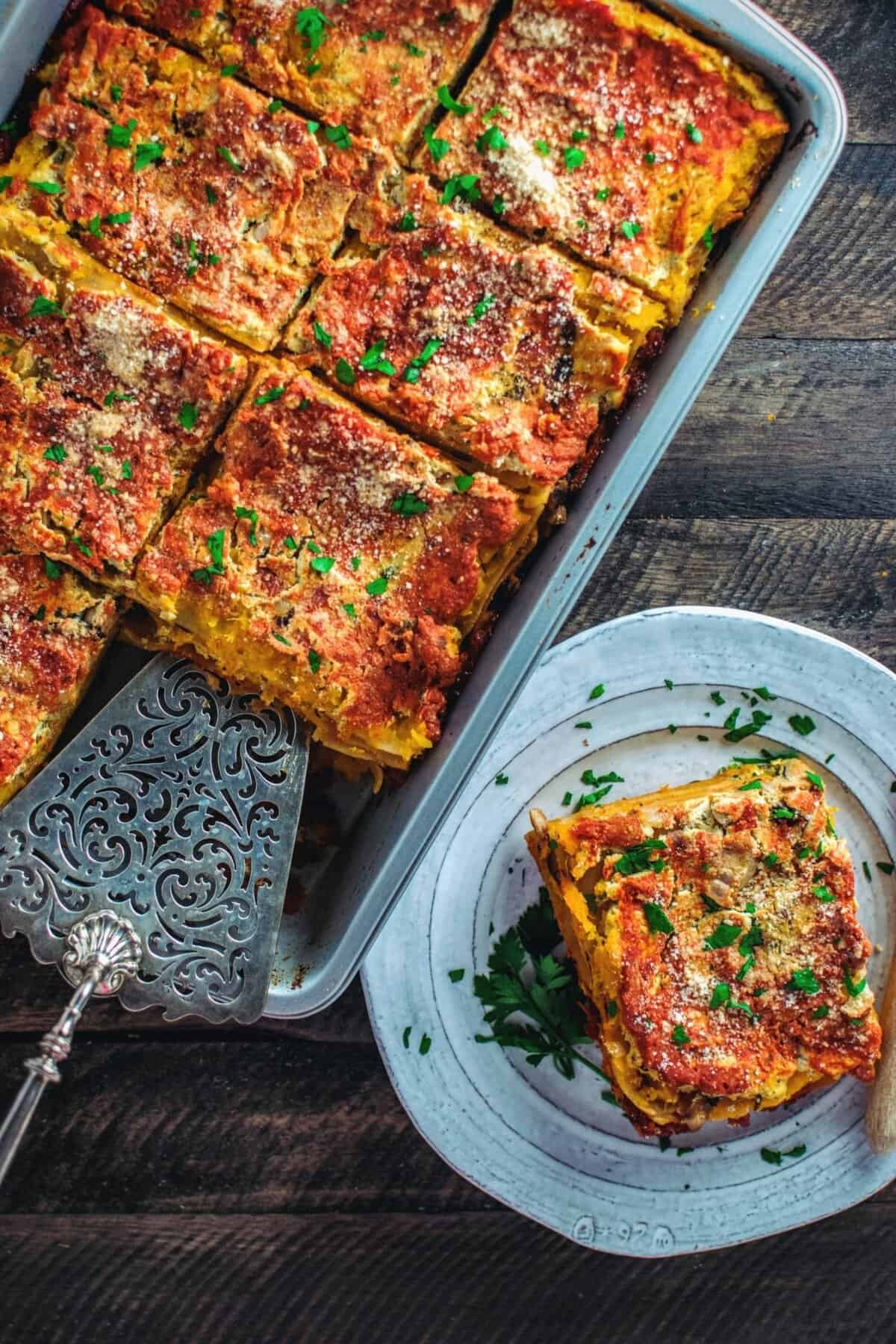 Layered vegan lasagna with tofu ricotta and herbs
