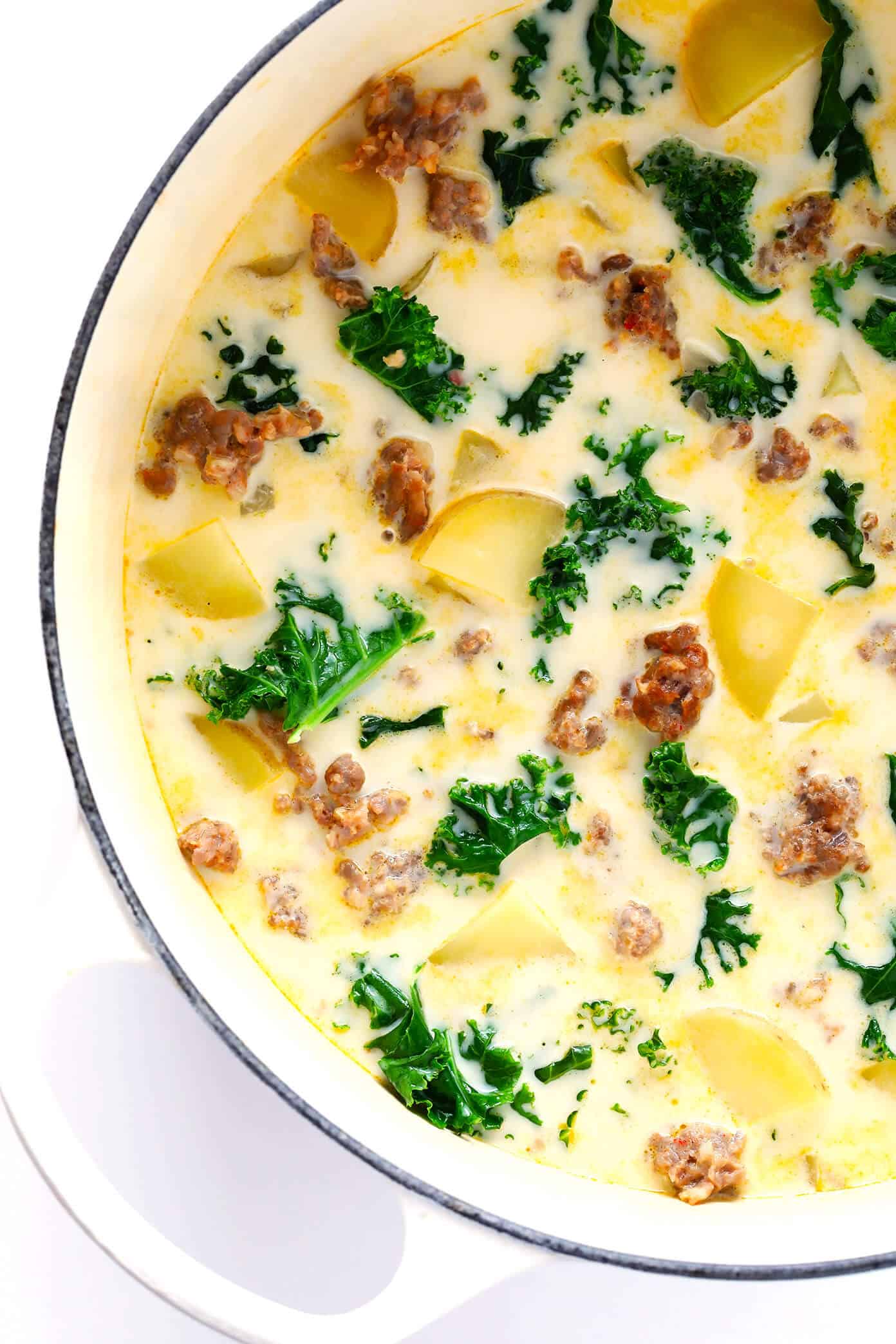 Creamy zuppa toscana with sausage, potatoes, and kale